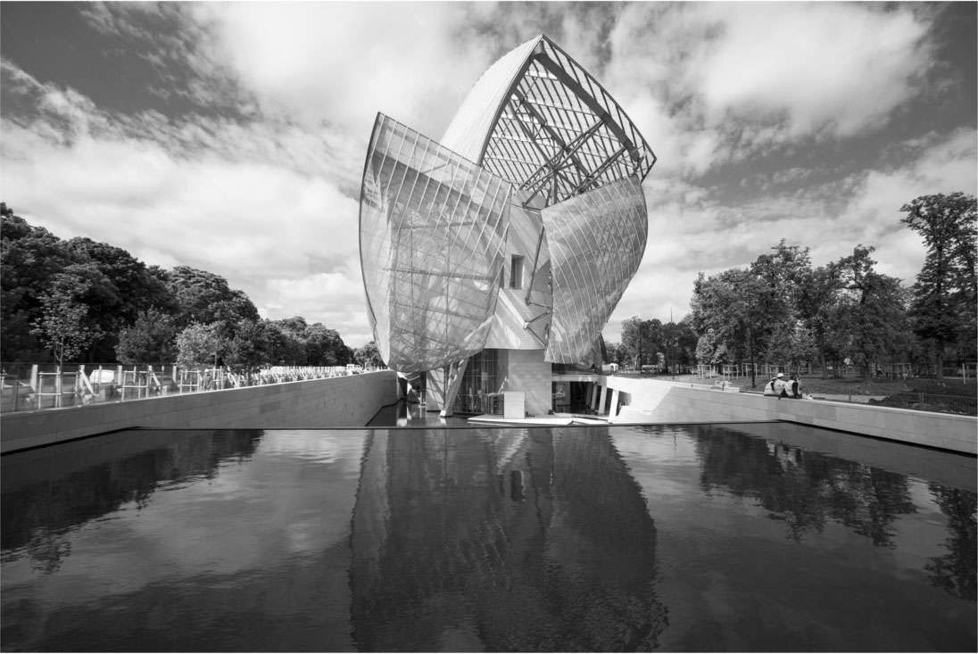 Museum Of Contemporary Art Of The Louis Vuitton Foundation Created By The  American Architect Frank Gehry, The Building Is Located Porte Maillot At  The Entrance Of The Bois De Boulogne. Stock Photo